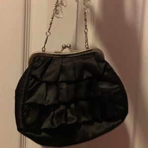 small black hand bag